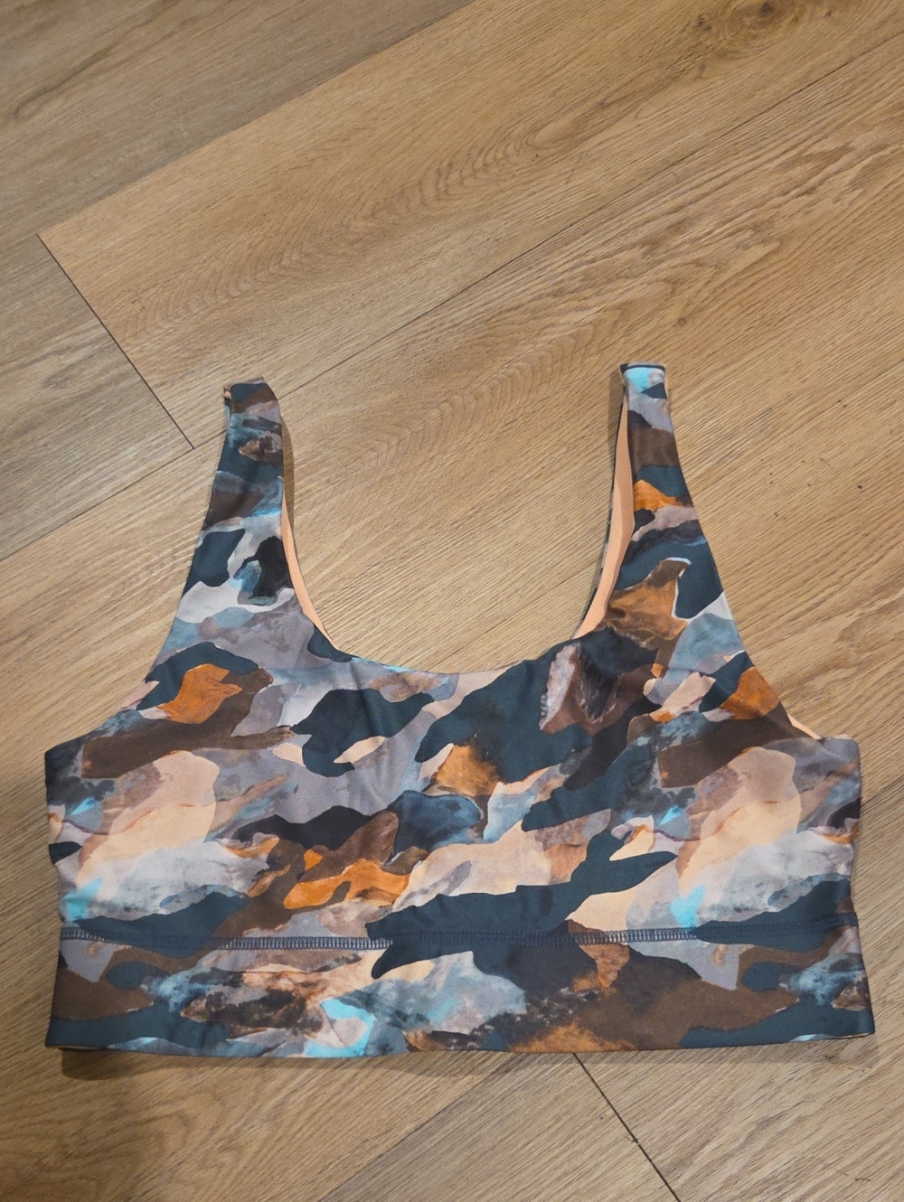 Fabletics Abstract Print Sports Bra in Teal, Orange, Brown Other Side Is Peach